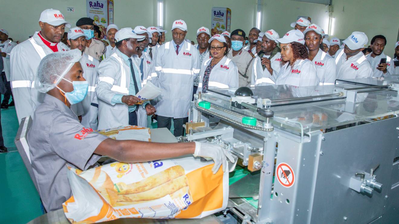 Anne Waiguru touring a flour milling plant. PHOTO/COURTESY